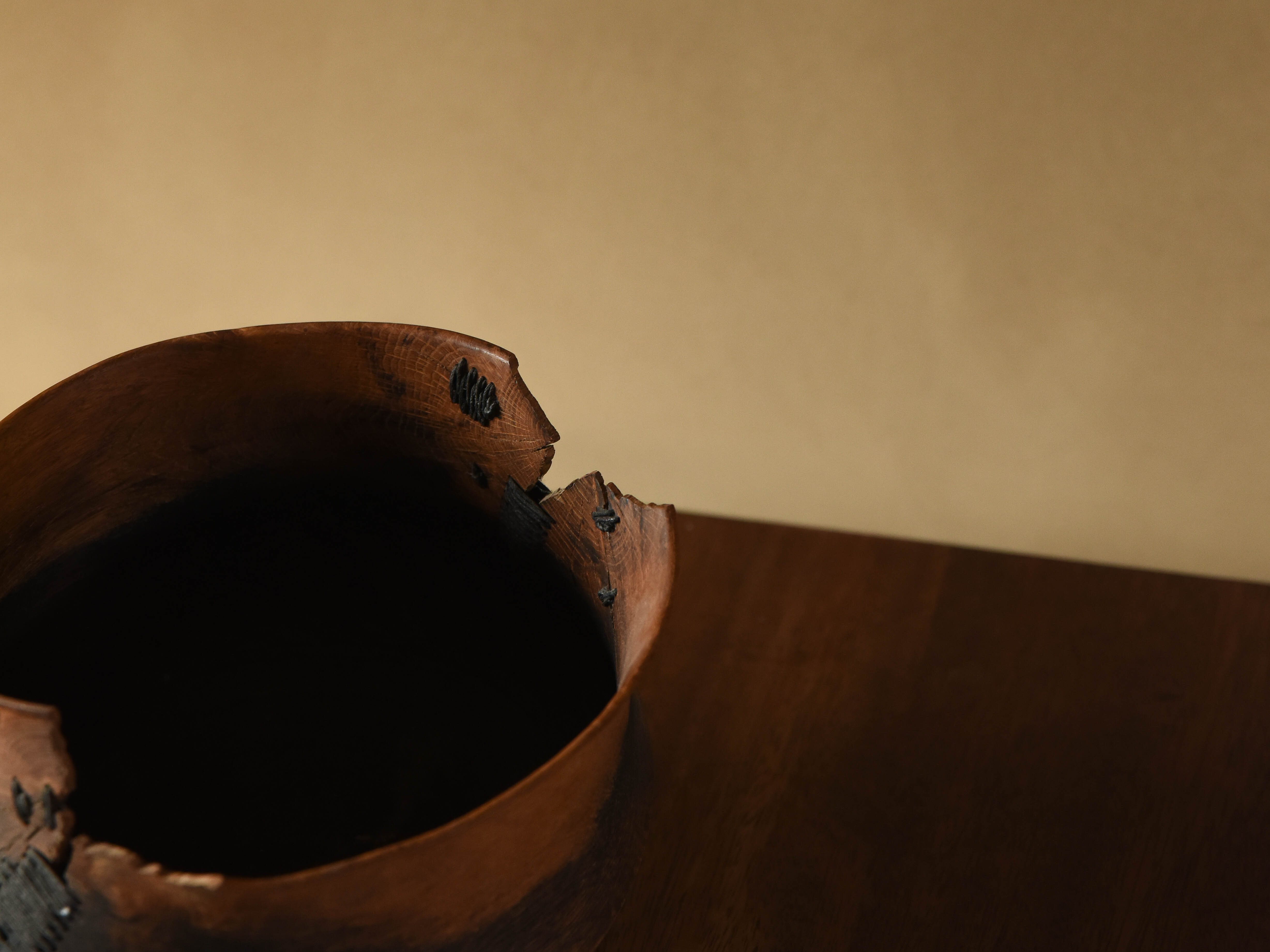 Turned and stitched wooden bowl detail